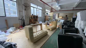 Artisan-built wooden sofa frames in production. Precision-cut components for premium furniture builds.