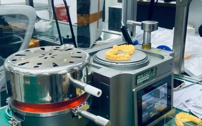 Advanced dental aligner molding equipment in operation within a digital lab environment.