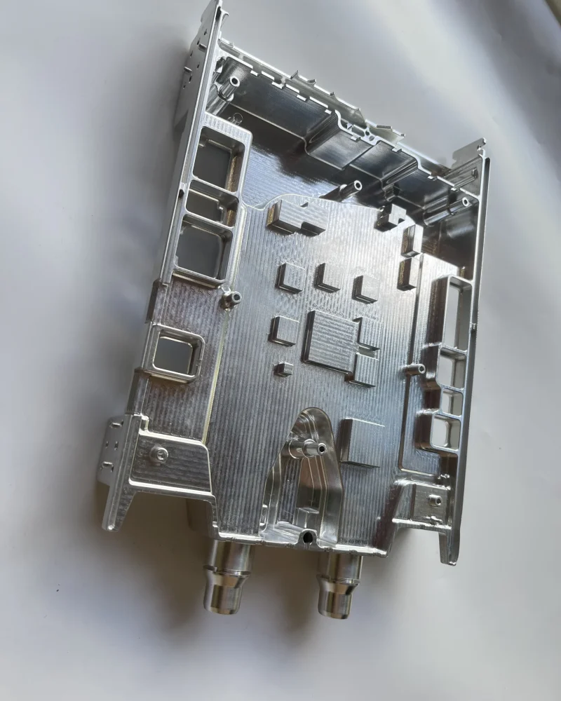 Intricate aluminum housing with milled features for high-tech enclosures and control units.