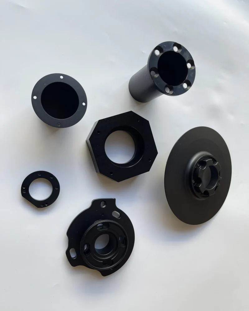 Custom CNC-turned plastic and metal components for automotive and industrial applications.